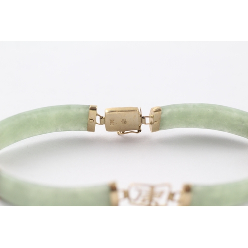 236 - 9ct gold jade bracelet with Chinese symbols