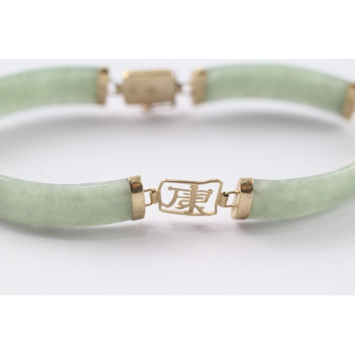 236 - 9ct gold jade bracelet with Chinese symbols