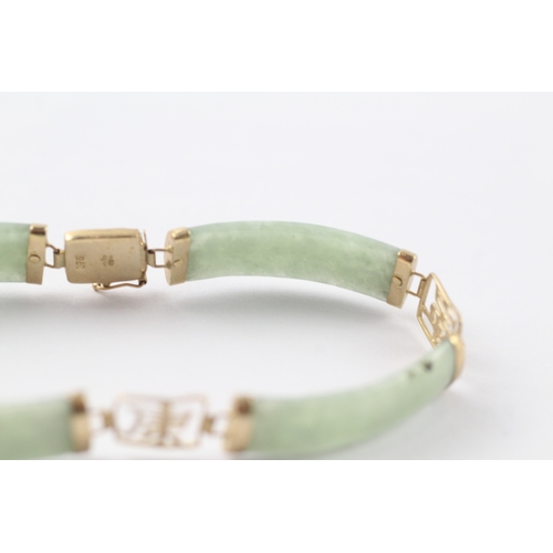 236 - 9ct gold jade bracelet with Chinese symbols