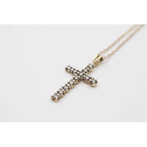 243 - 9ct gold diamond cross pendant necklace (1.9g)