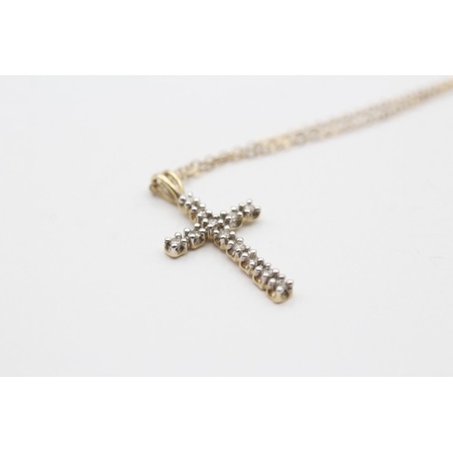 243 - 9ct gold diamond cross pendant necklace (1.9g)