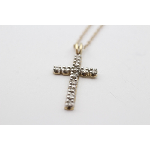 243 - 9ct gold diamond cross pendant necklace (1.9g)