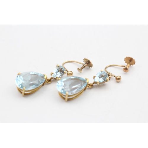 246 - 9ct gold antique blue topaz drop earrings (7.3g)