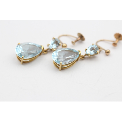 246 - 9ct gold antique blue topaz drop earrings (7.3g)