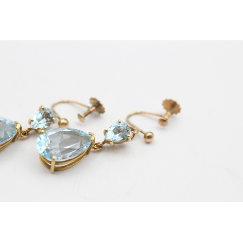 246 - 9ct gold antique blue topaz drop earrings (7.3g)