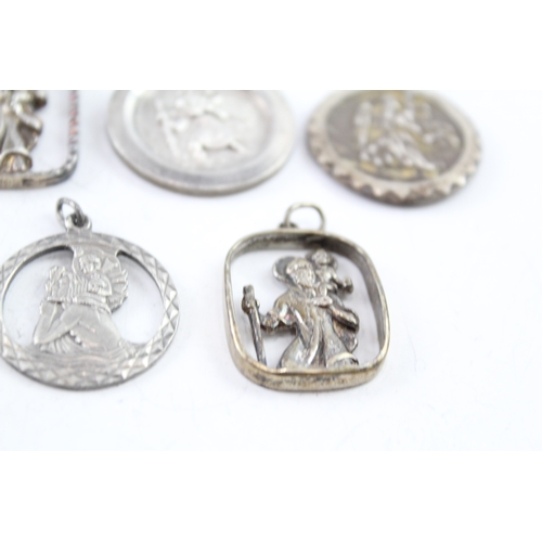 287 - Collection of Sterling Silver St Christopher Pendants inc. Georg Jensen x 7 61g