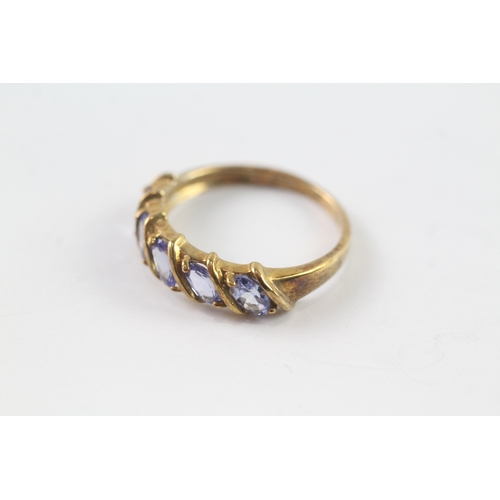 31 - 9ct gold tanzanite five stone dress ring (2.2g) Size N 1/2