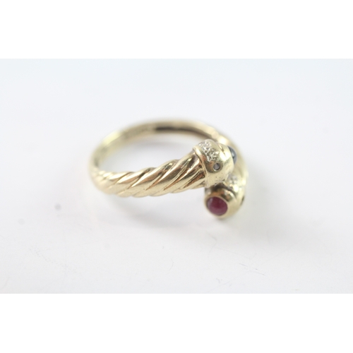 39 - 9ct gold ruby and sapphire bypass dress ring (2.4g) Size P