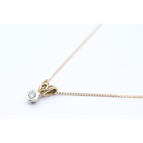 48 - 9ct gold single diamond pendant on chain (1.9g)