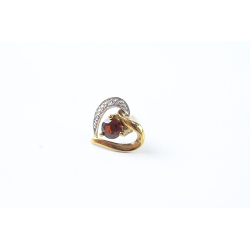 50 - 9ct gold garnet & diamond heart shape stud earrings (1.1g)