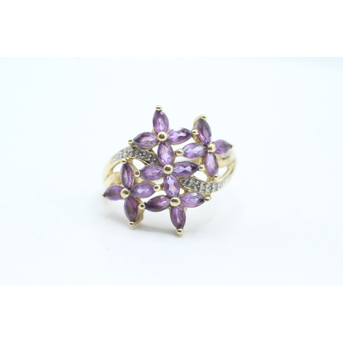 51 - 9ct gold amethyst and diamond flower cluster set ring (4.7g) Size U