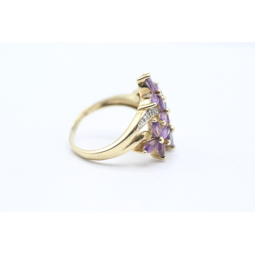 51 - 9ct gold amethyst and diamond flower cluster set ring (4.7g) Size U