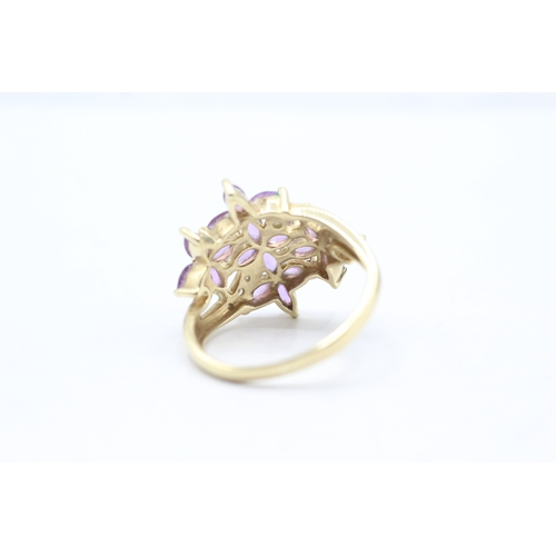 51 - 9ct gold amethyst and diamond flower cluster set ring (4.7g) Size U