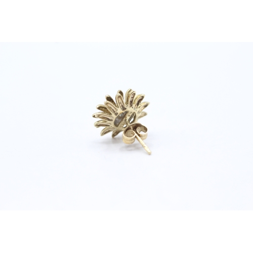 64 - 9ct gold diamond sunflower stud earrings (3.4g)