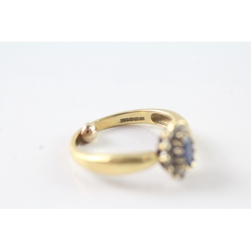 7 - 18ct gold sapphire and diamond halo dress ring (4.3g) Size J