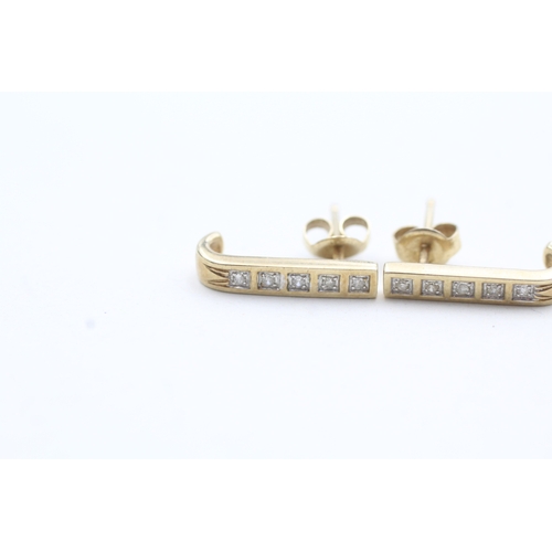 73 - 9ct gold diamond bar stud earrings (1.5g)