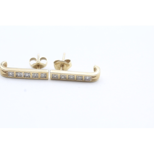 73 - 9ct gold diamond bar stud earrings (1.5g)