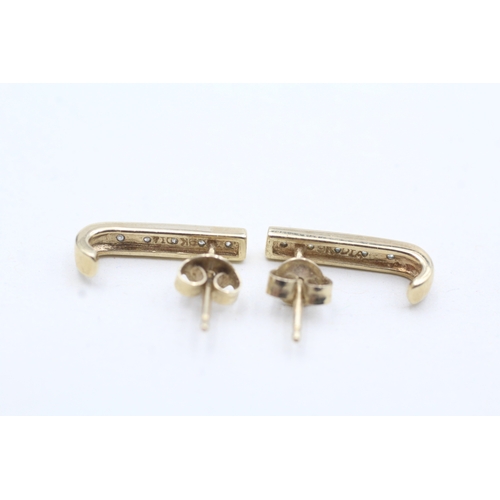 73 - 9ct gold diamond bar stud earrings (1.5g)