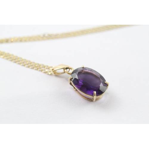 76 - 14ct gold oval cut amethyst pendant with a 9ct gold chain (2.9g)