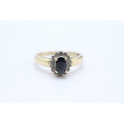 82 - 9ct gold sapphire and diamond halo set ring (2.1g) Size M 1/2