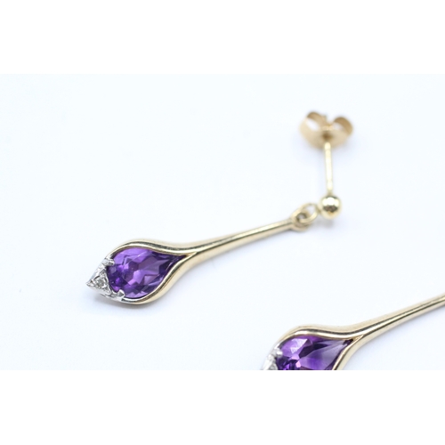 83 - 9ct gold amethyst and diamond drop stud earrings (1.9g)