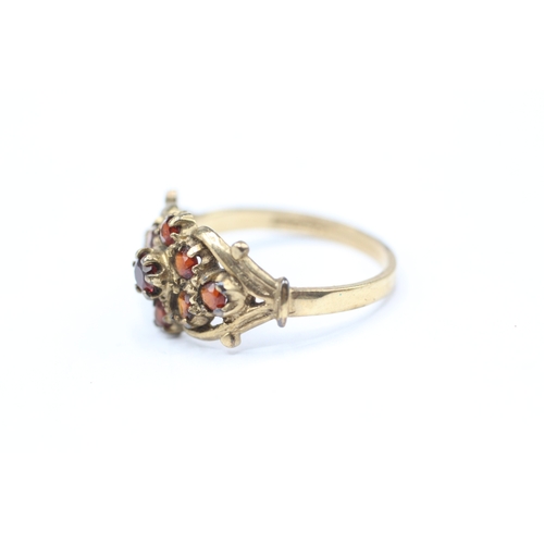 88 - 9ct gold and red gemstone ring (2.9g) Size R