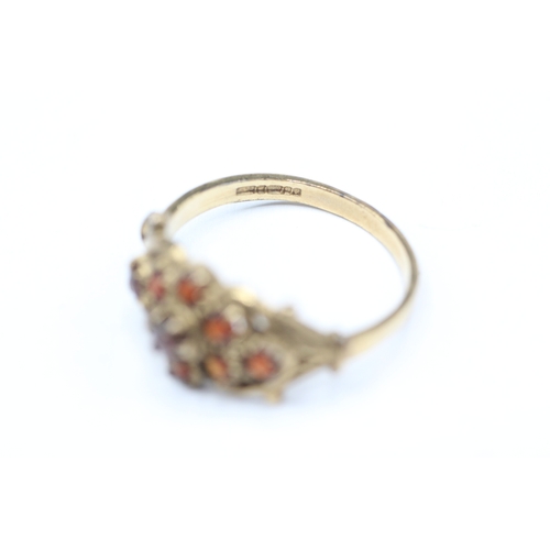 88 - 9ct gold and red gemstone ring (2.9g) Size R