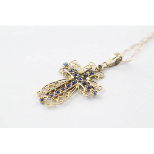 90 - 9ct gold sapphire cross pendant on chain (1.1g)