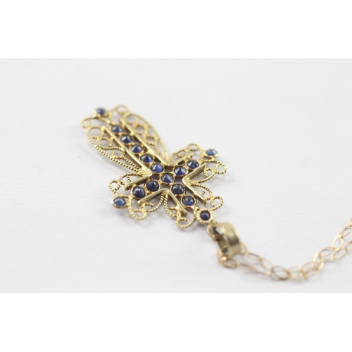 90 - 9ct gold sapphire cross pendant on chain (1.1g)