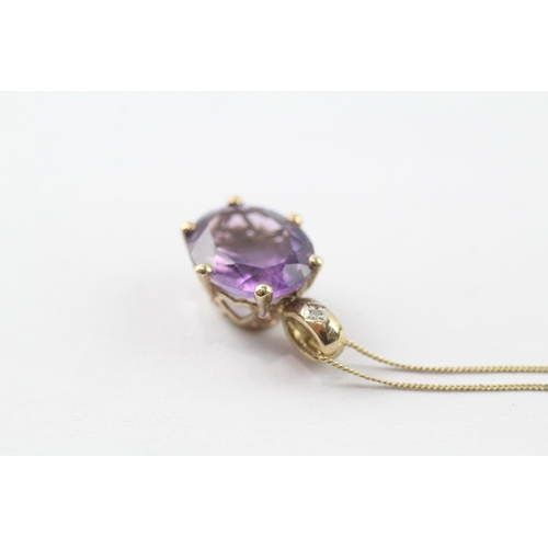 92 - 9ct gold oval cut amethyst & diamond pendant necklace