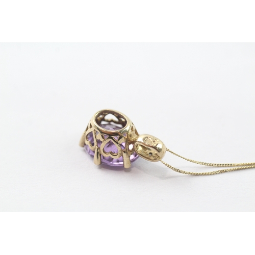 92 - 9ct gold oval cut amethyst & diamond pendant necklace