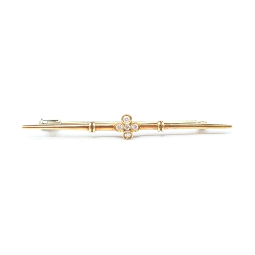 93 - 14ct gold diamond set bar brooch (2.6g)