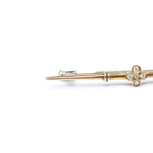 93 - 14ct gold diamond set bar brooch (2.6g)