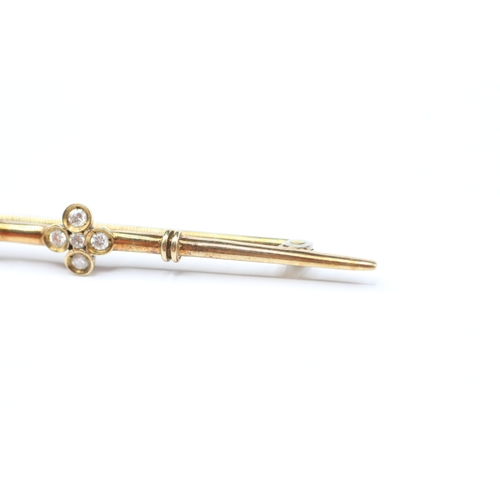 93 - 14ct gold diamond set bar brooch (2.6g)