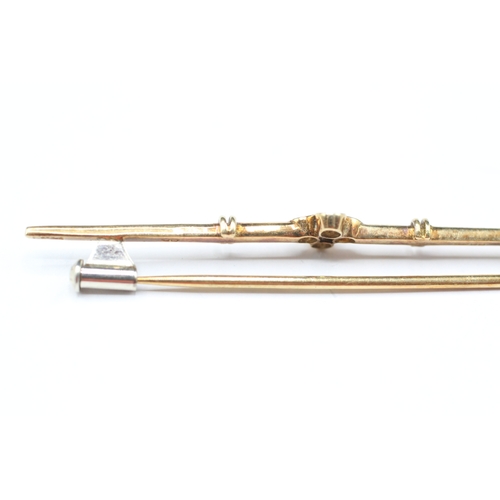 93 - 14ct gold diamond set bar brooch (2.6g)