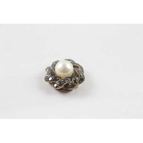 106 - 9ct gold diamond and pearl pendant