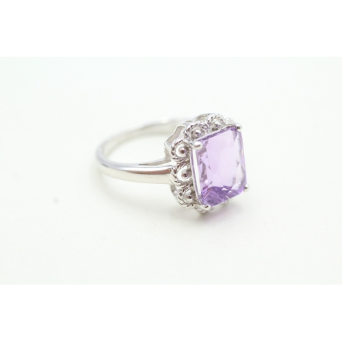 111 - 9ct gold fancy cut amethyst dress ring (4g) Size N