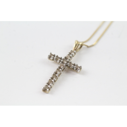 112 - 9ct gold diamond cross pendant on chain