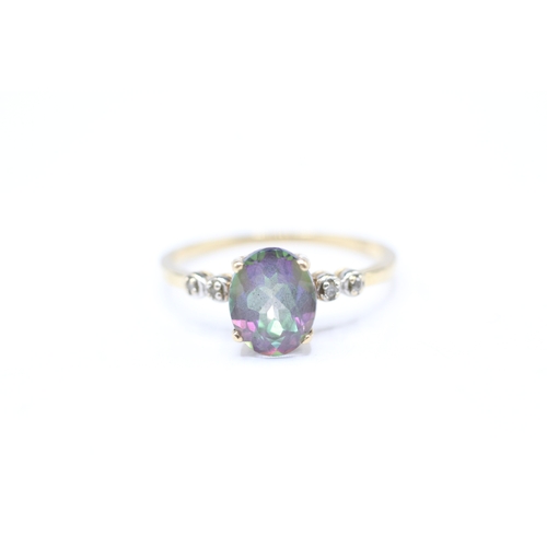 124 - 9ct gold mystic topaz and diamond ring (2g) Size R