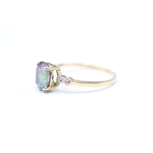 124 - 9ct gold mystic topaz and diamond ring (2g) Size R