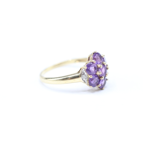 131 - 9ct gold amethyst and diamond ring (2.1g) Size P