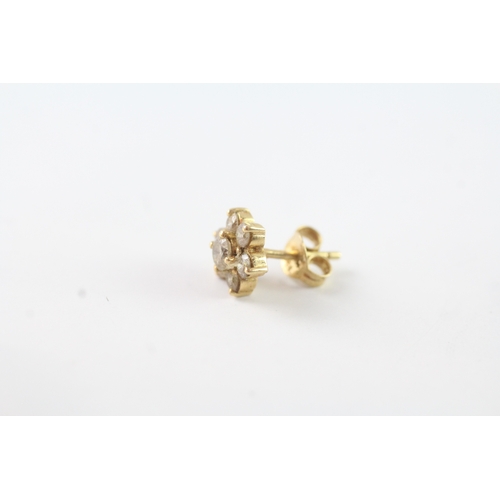 139 - 18ct gold diamond floral stud earrings (1.8g)