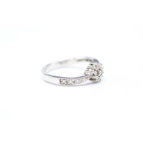 141 - 9ct gold and diamond ring (2.6g) Size K