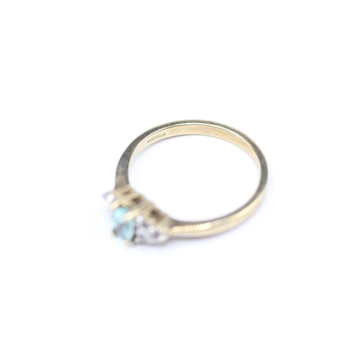 142 - 9ct gold blue and white gemstone ring (1.6g) Size J 1/2