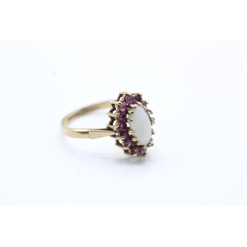 148 - 9ct gold opal and ruby set ring (2.6g) Size P