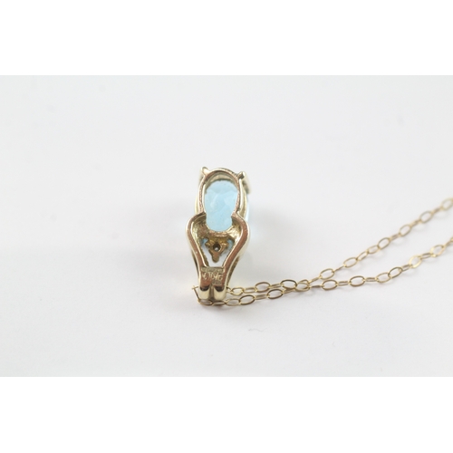 150 - 9ct gold blue gemstone and diamond pendant on chain