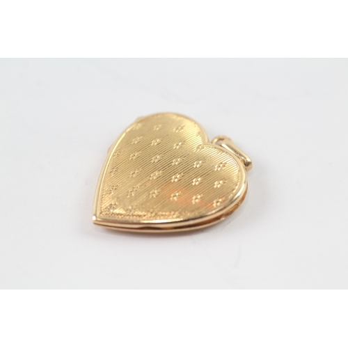 16 - 18ct gold antique patterned heart shape locket