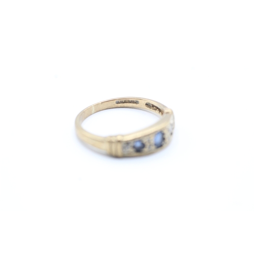 161 - 9ct gold sapphire and diamond flush set ring (2.4g) Size N