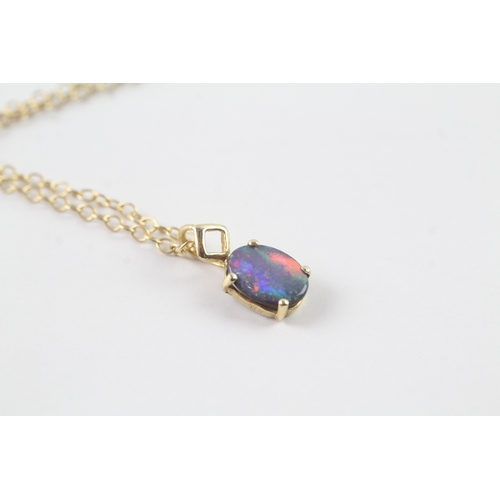 162 - 14ct gold opal triplet pendant on chain