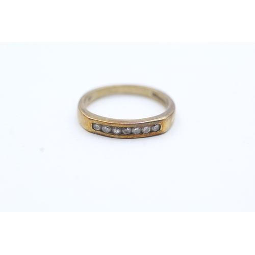 165 - 9ct gold diamond channel setting ring (1.8g) Size O 1/2